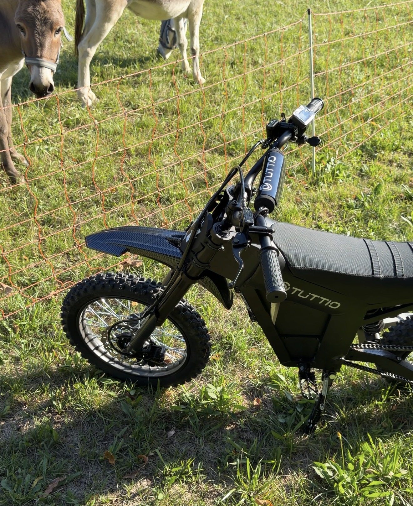 Electric dirt bike cockpit during real-world outdoor testing